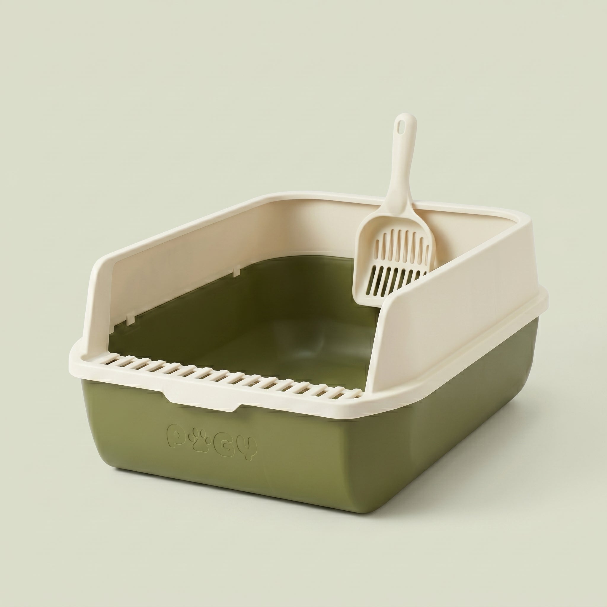 Caixa de areia semi-fechada extra grande Pugy Clean Max — vista 3/4 com pá inclusa em fundo verde